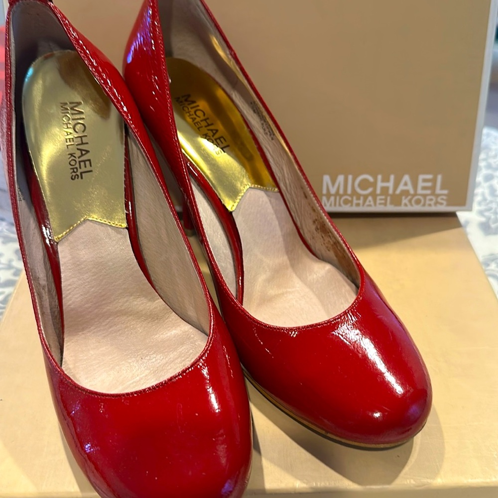 Red patent leather heels.